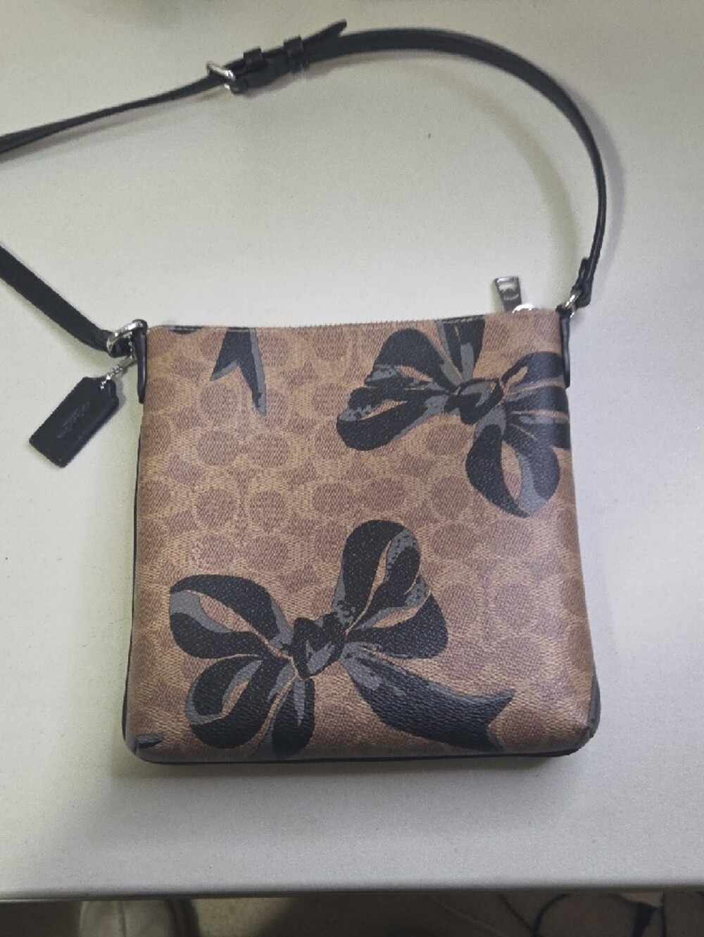Coach Mini Rowen File Brown Floral-Print Crossbody with Black Accents - Picture 8 of 8